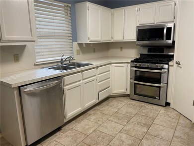 Kitchen has stainless steel appliances. Including 