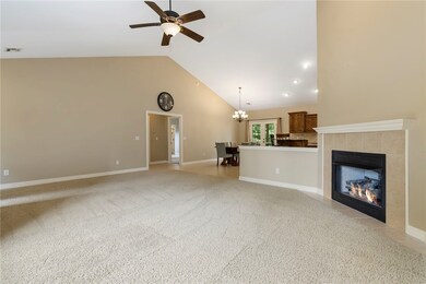 Tall ceilings in the living room make the space fe