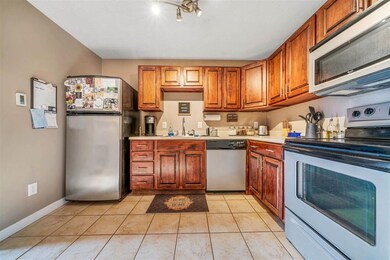 Wood cabinets, fully-applianced, tile flooring...