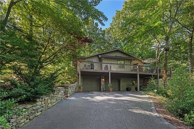 2 car garage, good sized deck and stone accent walls