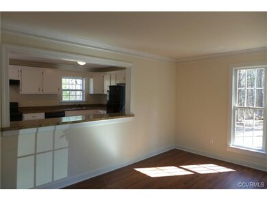 View from living room into kitchen through pass-th