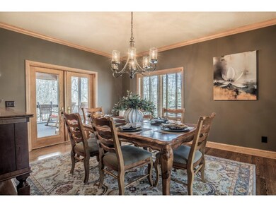 Formal dining room with crown molding and easy scr