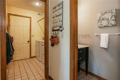 Half bathroom located conveniently by front door, 