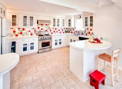 Kitchen with colorful tile backsplash!