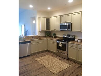 Large kitchen with plenty of cabinet space and sta
