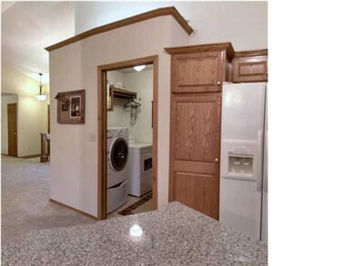 LAUNDRY Room to Garage. WASHER & DRYER stay.