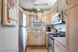 Kitchen with ceiling fan, sink, decorative light f