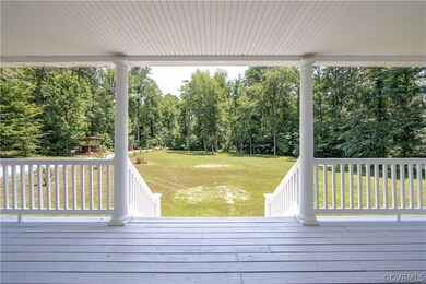 Love this full front porch with a wide stairway an