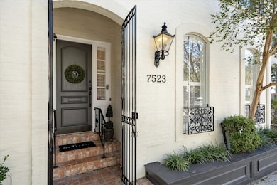 The ENTRY COVE is protected by wrought-iron security gates.