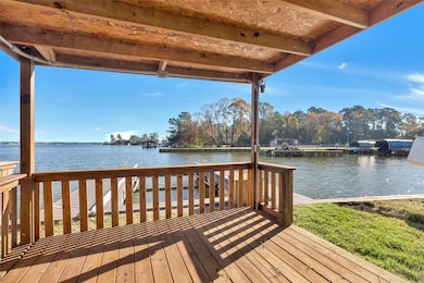 Covered deck for you to just sit out by the lake a