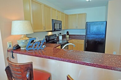 Kitchen featuring black appliances