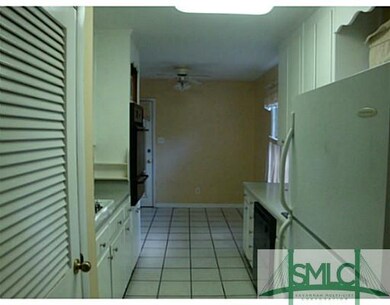 Exterior Front. Kitchen from foyer angle