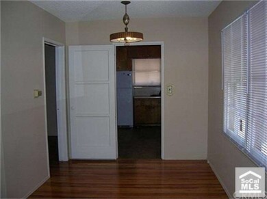 Dining area leading to kitchen