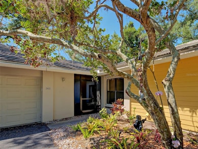 An inviting front door with tasteful landscaping.