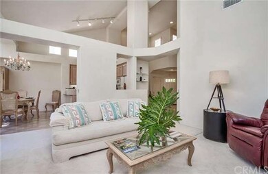 Spacious family room is open to the kitchen and di