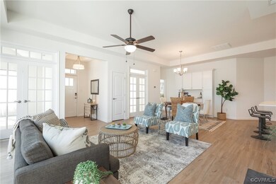 Living room with plenty of sunlight.