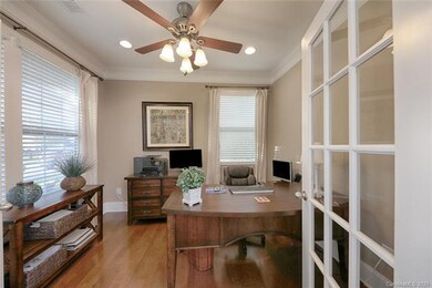 French doors add privacy to main level office