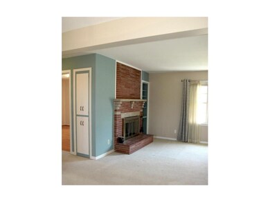 To the left of the linen closet is the spacious 1s
