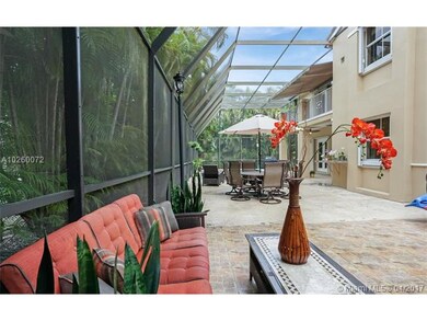 Double height screened pool-patio enclosure offers