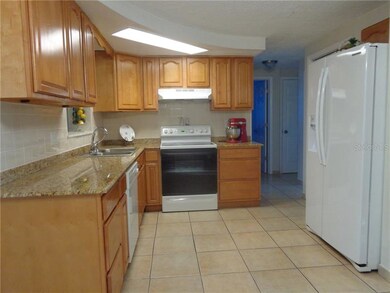 Kitchen has granite counter 