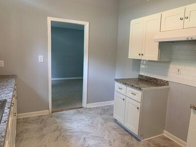 Kitchen leading to great room