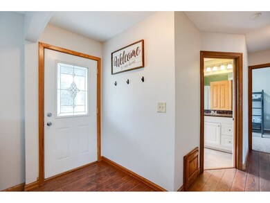 Inviting front entry.  Features easy-care flooring
