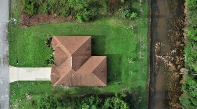 704 Aletha Ave S, Lehigh Acres, FL 33974 - photo 6