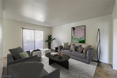Virtually staged spacious living room with sliders