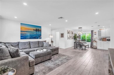 Living room featuring light hardwood / wood-style 