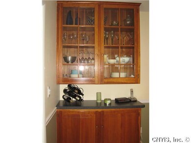 Kitchen. Handsome glass-front cupboards atop, extr