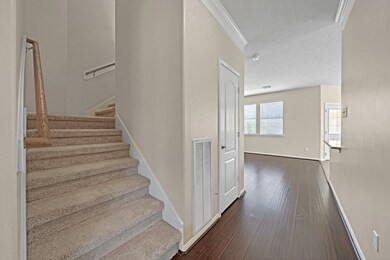 Stairs lead you to the game room which is central to the bedrooms, laundry room (how convenient), & secondary bath.