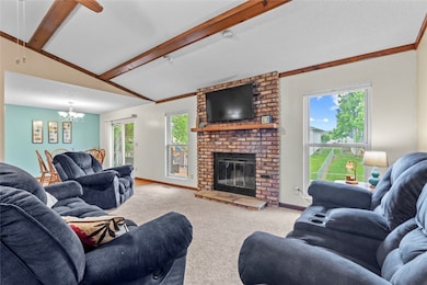 Open Living Room with Fireplace and New Windows