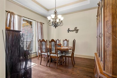 Formal dining room has nice views of the front yar