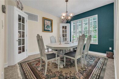 Tiled Formal Dining Room with Plantation Shutters