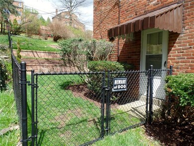 Side access to the completely fenced in back yard!