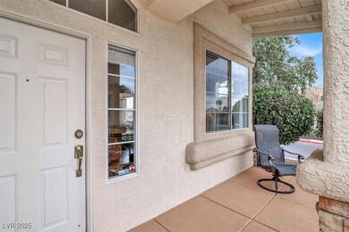 Entrance to property featuring stucco siding