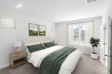 Bedroom with light carpet and recessed lighting