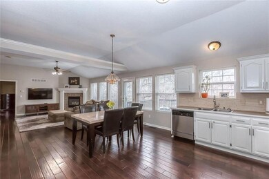 KITCHEN WITH ENAMELED CABINETS & SS APPLIANCES