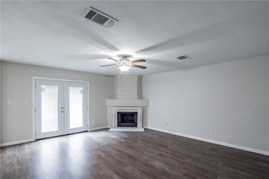 Unfurnished living room with french doors, ceilin