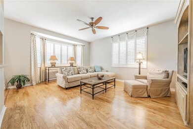 Built-in shutters with window treatments