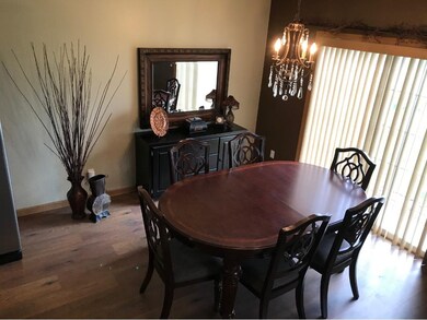 Dining area opens unto patio
