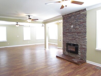 This view looks into the dining/hearth space from 