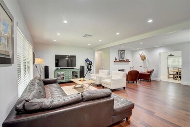 Large bright living area with Bamboo wood floor an