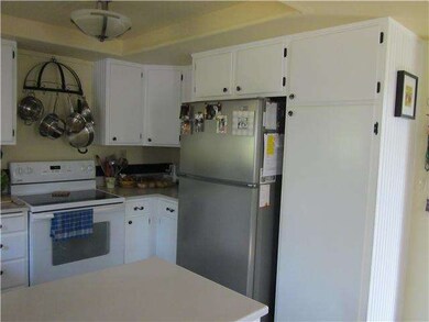 Stainless refrigerator. Pantry area.
