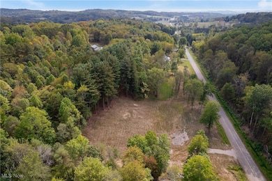 Aerial view of property and surrounding area