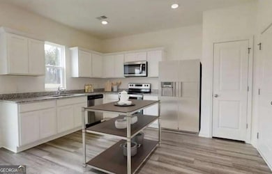 7661 Saffron Ave, Covington, GA 30014 - photo 2