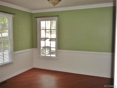 Formal Dining Room features Hardwood Laminate Floo