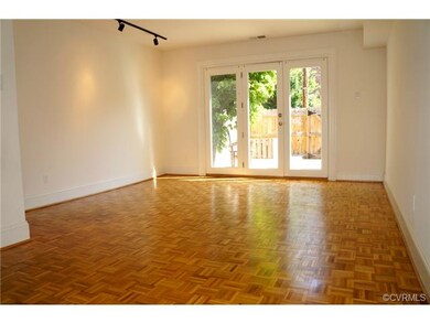 Bright and spacious family room with beautiful woo