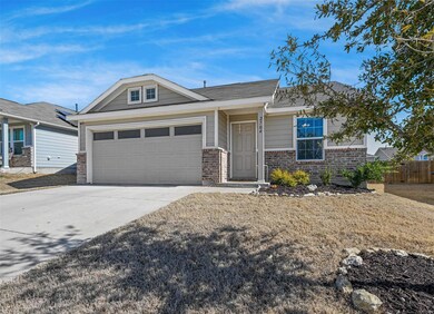 View of front of property featuring brick siding, 