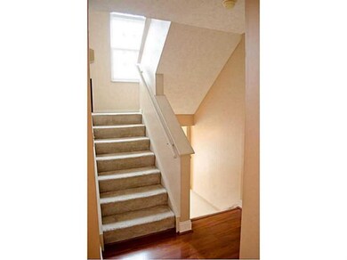 Entry/Foyer. THe entryway steps up to beautiful la